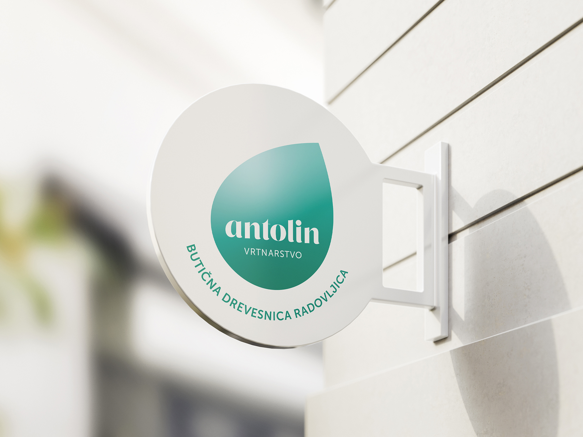 Visualisation of the Vrtnarstvo Antolin corporate brand identity design use case, showing a metal sign example.