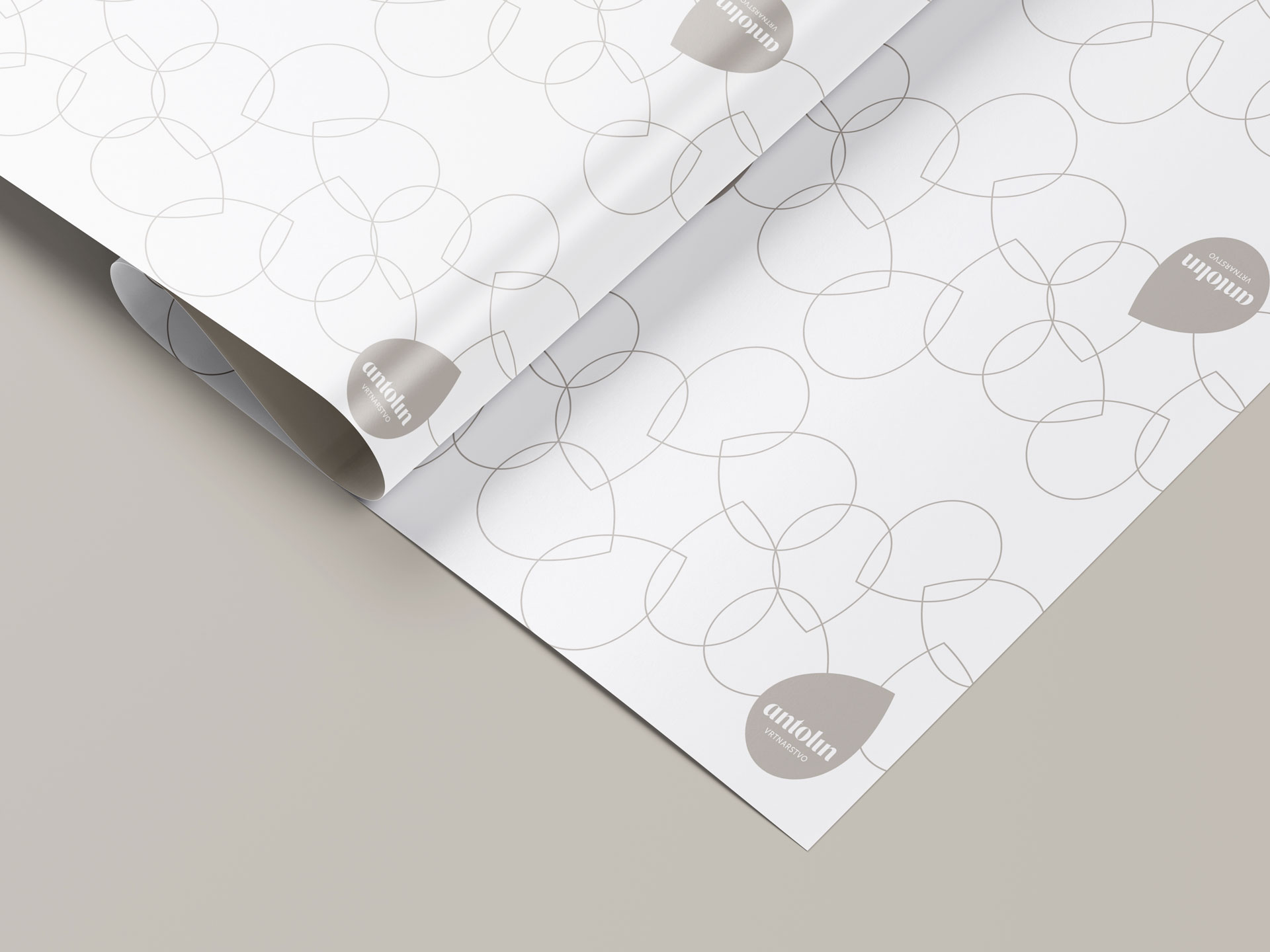 Visualisation of the Vrtnarstvo Antolin corporate brand identity design use case, showing the Antolin custom wrapping paper.